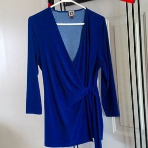 Anne Klein top. Blue with black dots. large. Tie waist, faux. Good condition.+